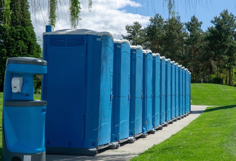 standard porta potties at a park